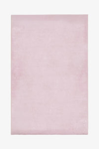 Blush light pink wool rug in 6x9 or 5x7 size, perfect for nursery rugs, bedroom rugs, or soft pastel modern interiors