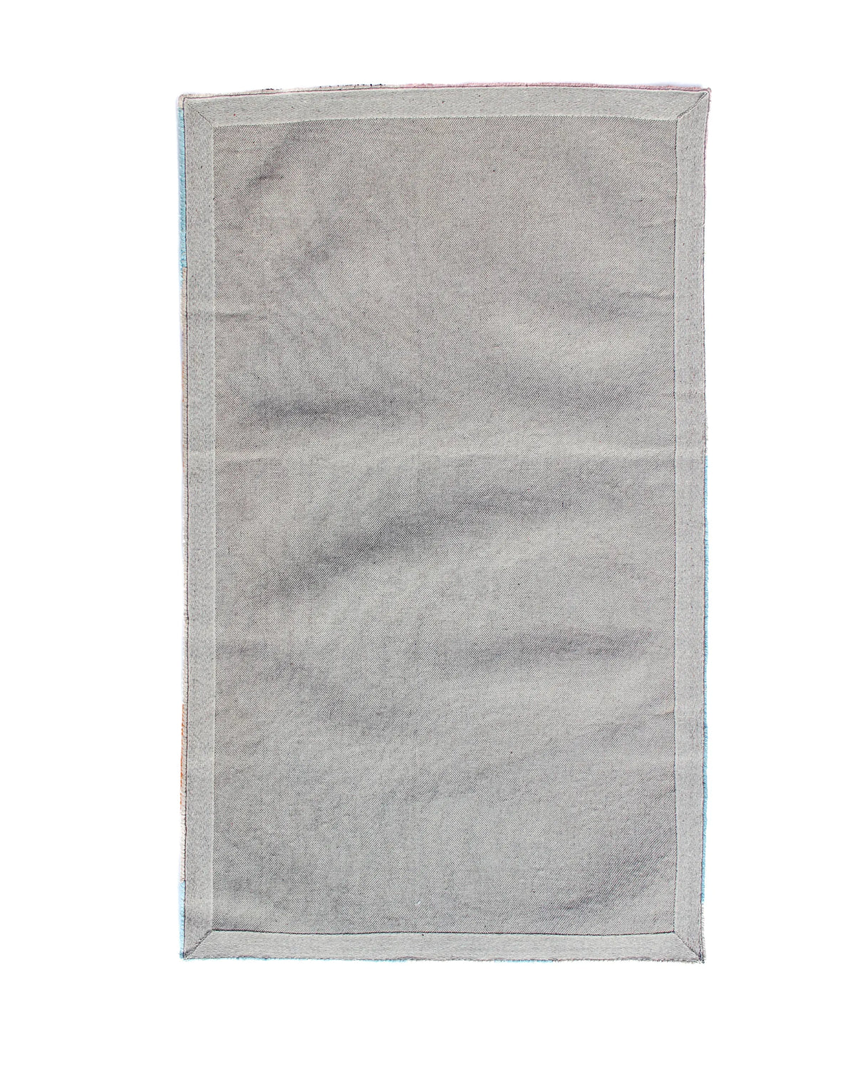 Handmade tropical-inspired wool rug with soft texture
