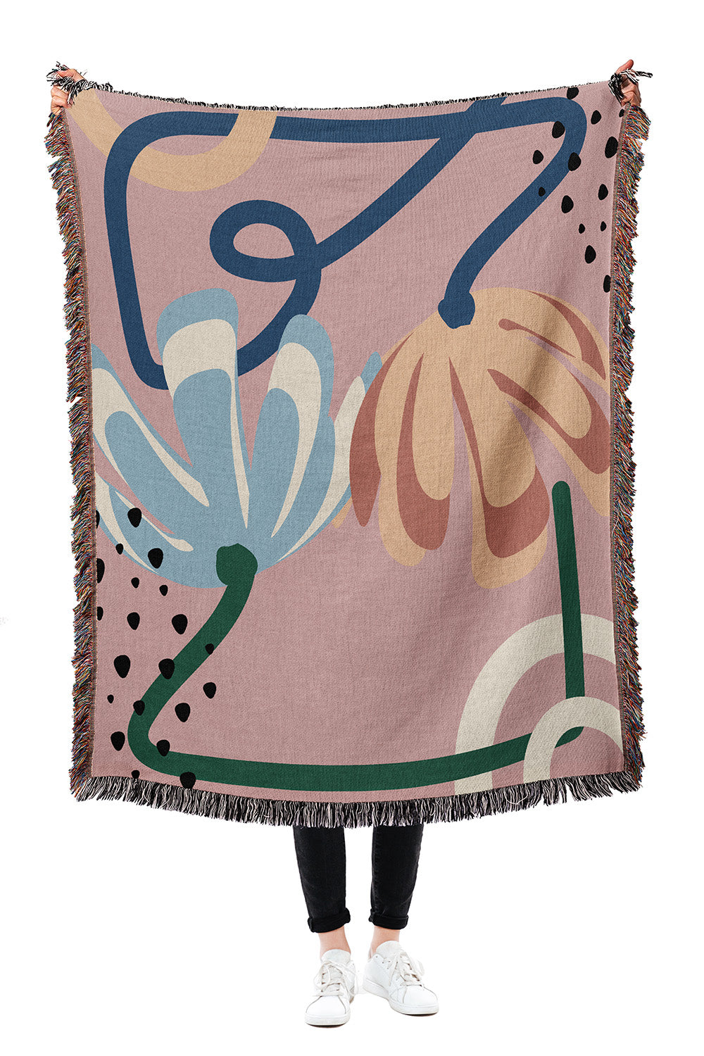 Abstract Garden Pink Cotton Woven Throw Blanket with a vibrant flower abstract design and fringe edges.