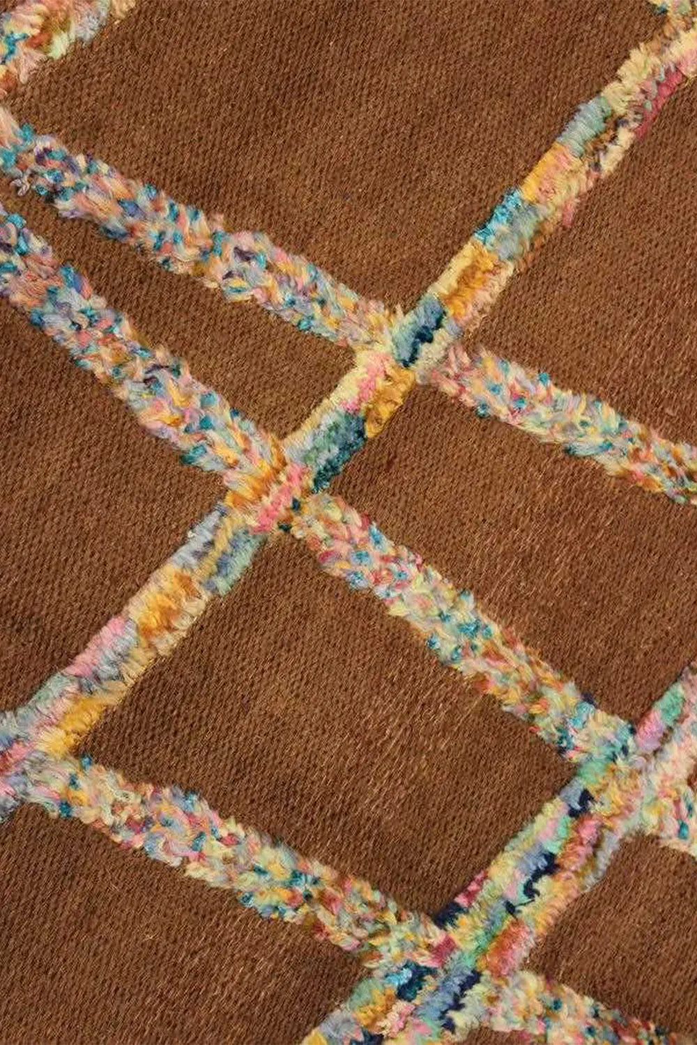 Contemporary hand-knotted rug with a brown abstract design.