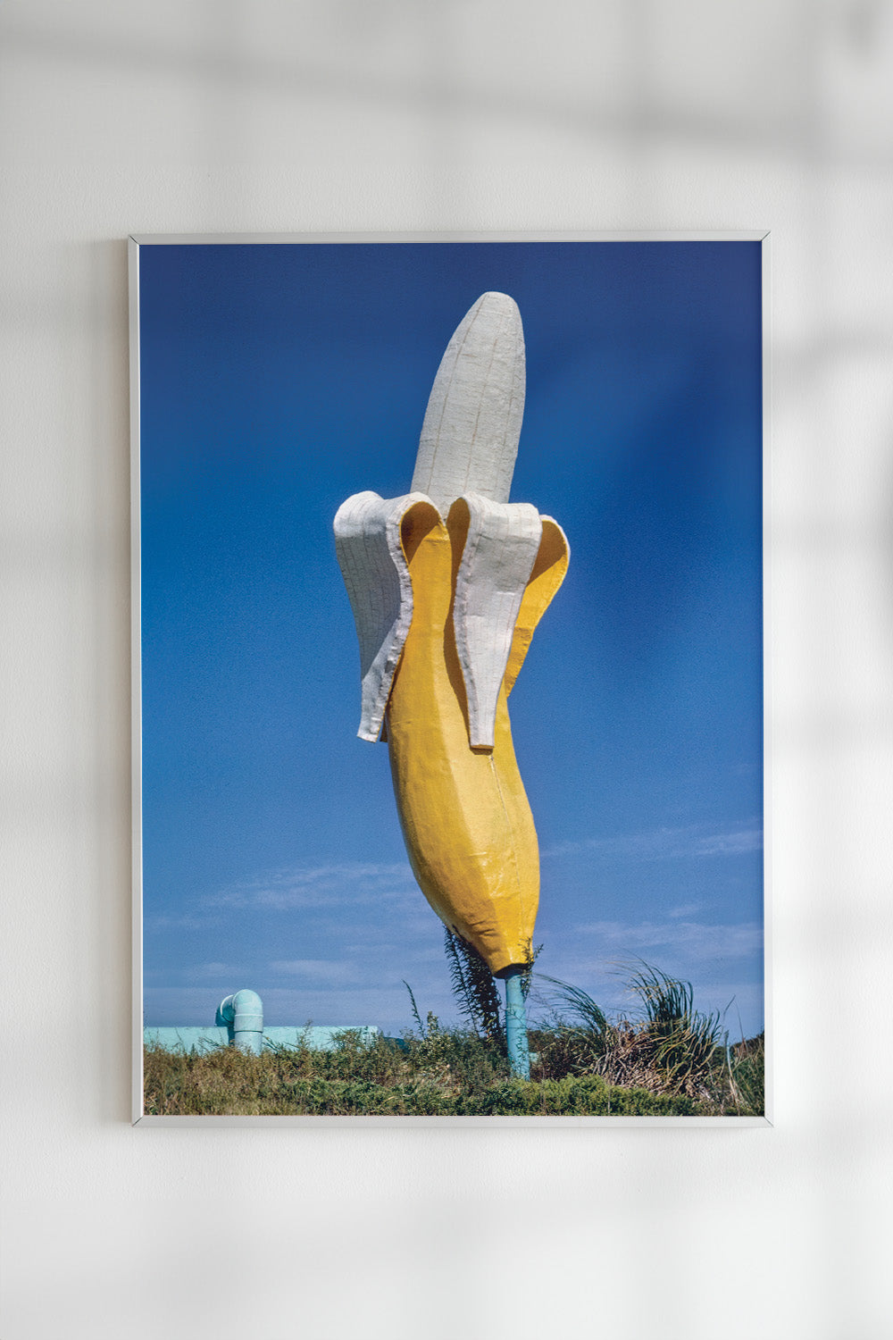 John Margolies' photograph of Banana Waterslide roadside attraction with bright blue sky.