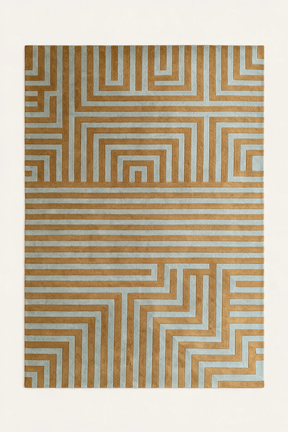 a maze hand-tufted wool rug in mist and ochre, shown flat from above