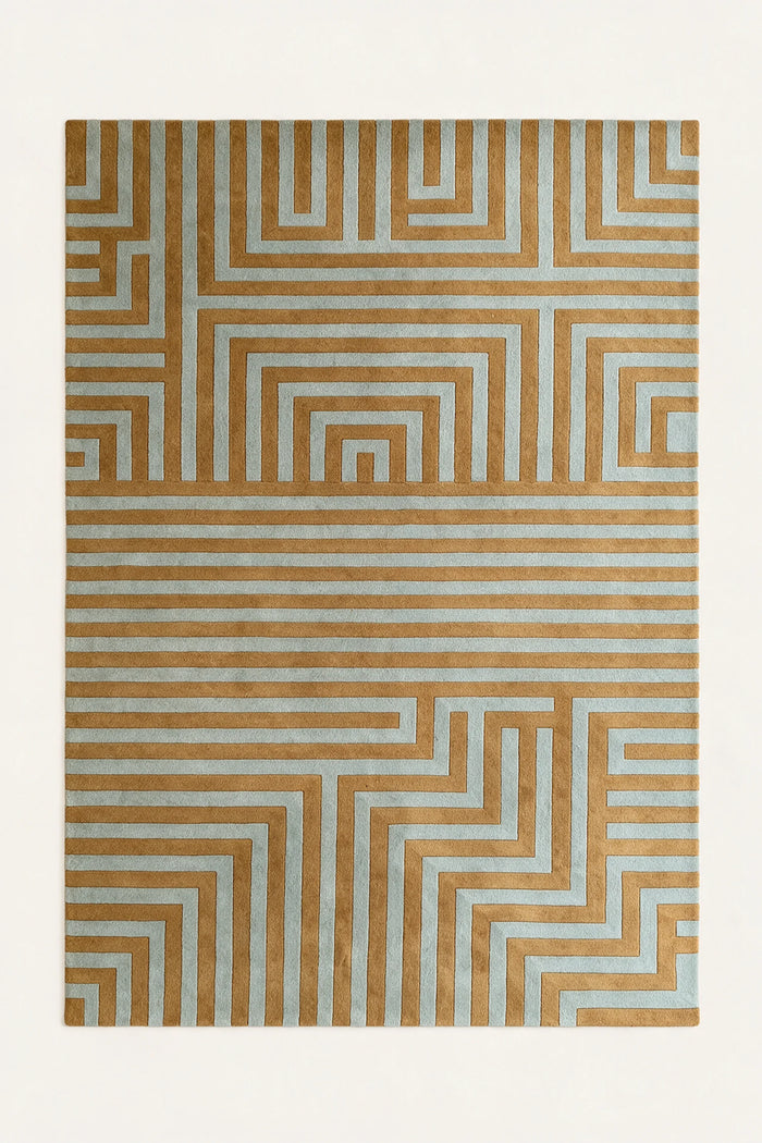 a maze hand-tufted wool rug in mist and ochre, shown flat from above