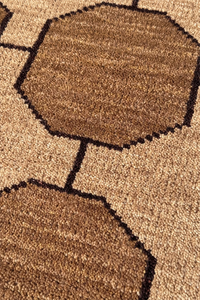 taupe runner rug with abstract patterns