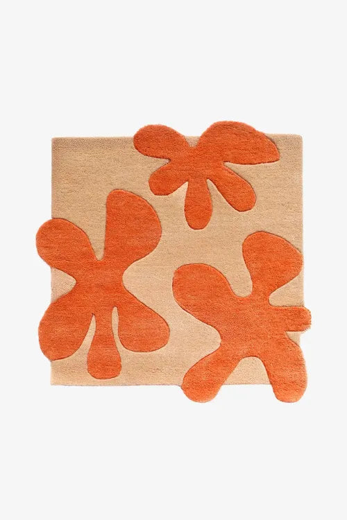 orange rug with floral design