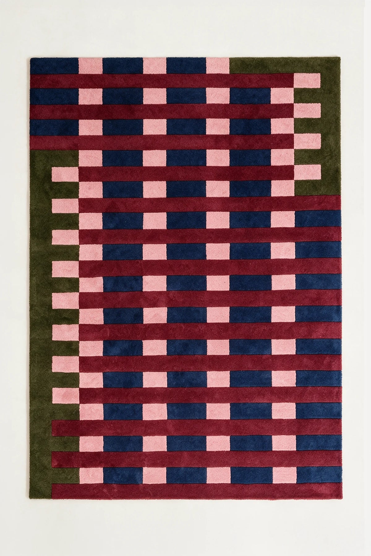 a orchard hand-tufted wool rug in forest, burgundy, navy and blush, shown flat from above
