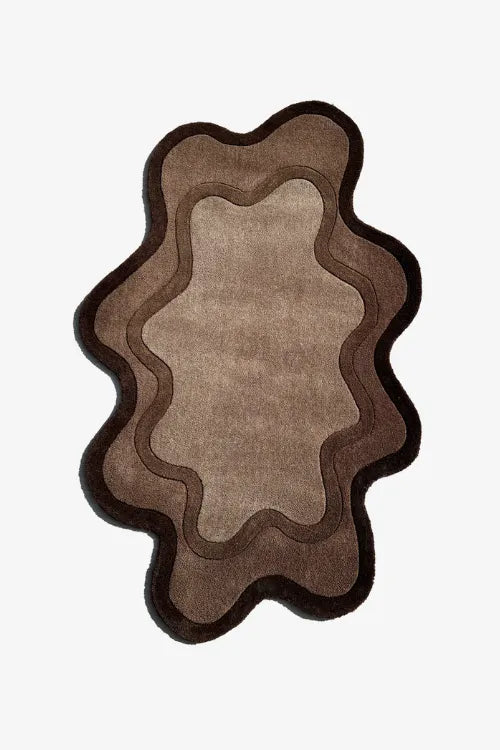 brown rug in wavy irregular shape