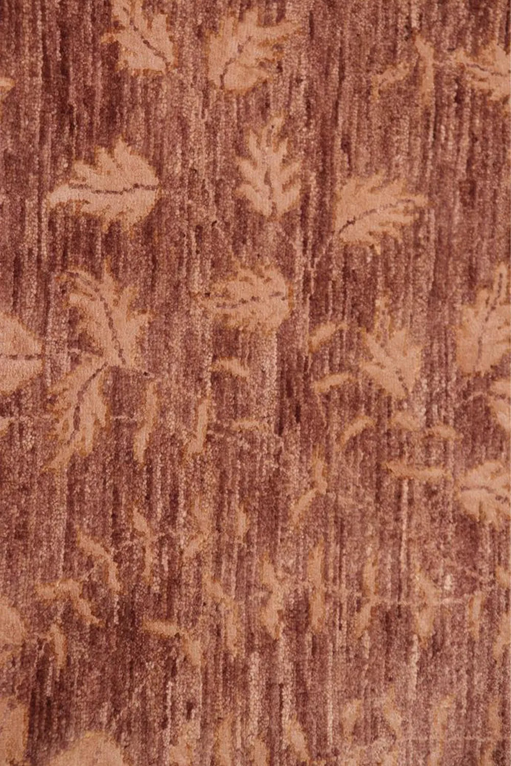 Reddish-brown wool rug with a delicate pattern for a refined interior style.
