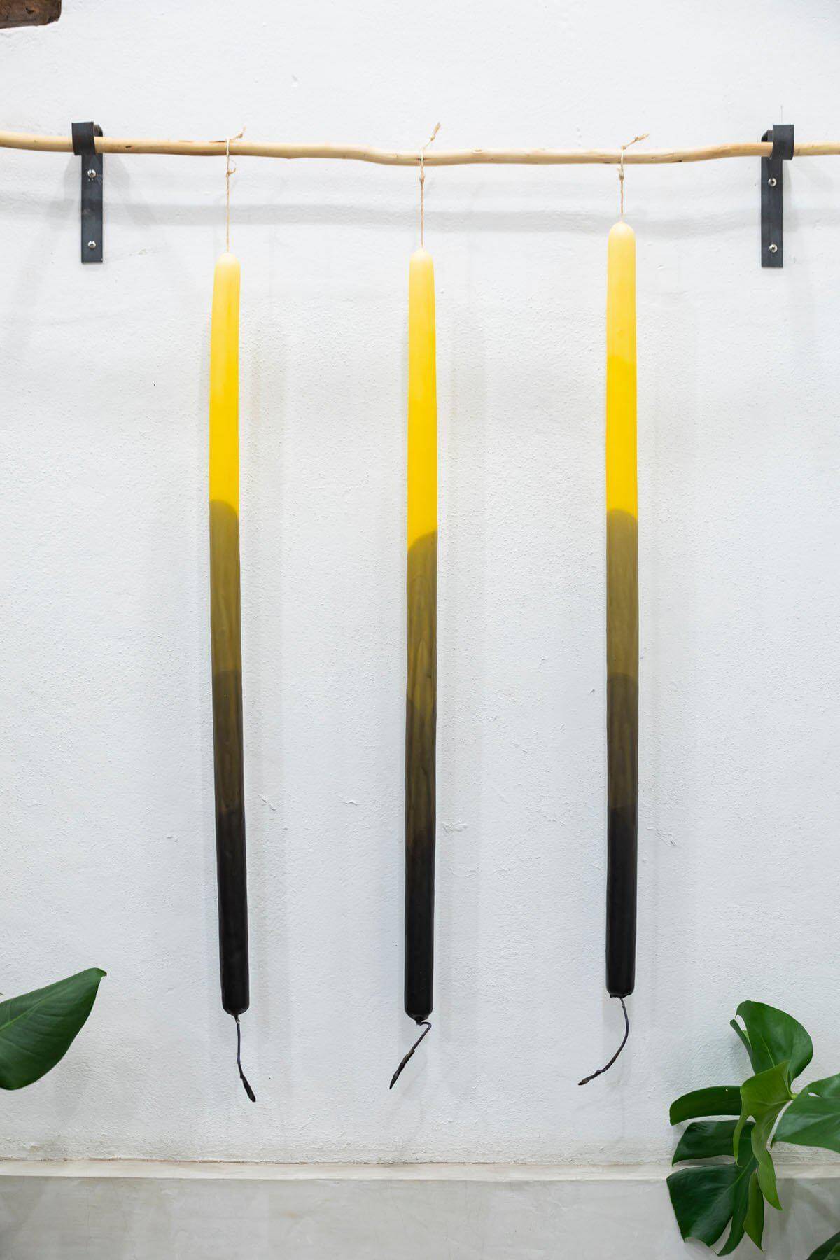 Full view of the extra-large candle, highlighting its impressive length of 34.6 inches.