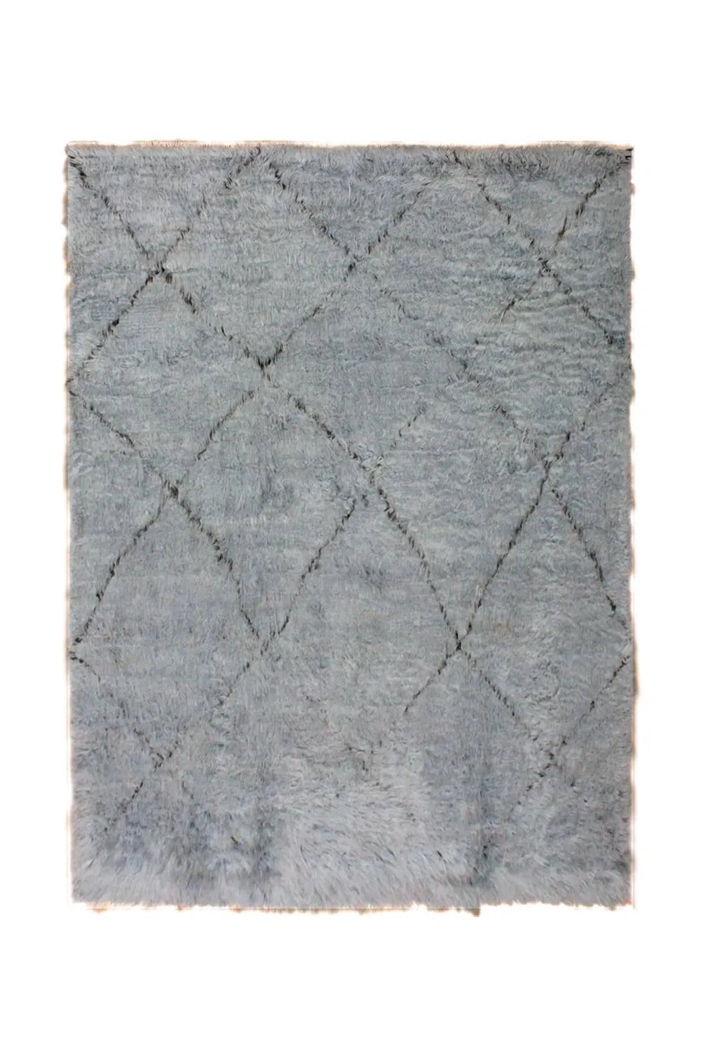 Plush gray shag rug with a subtle diamond pattern, adding a touch of luxury to any room.