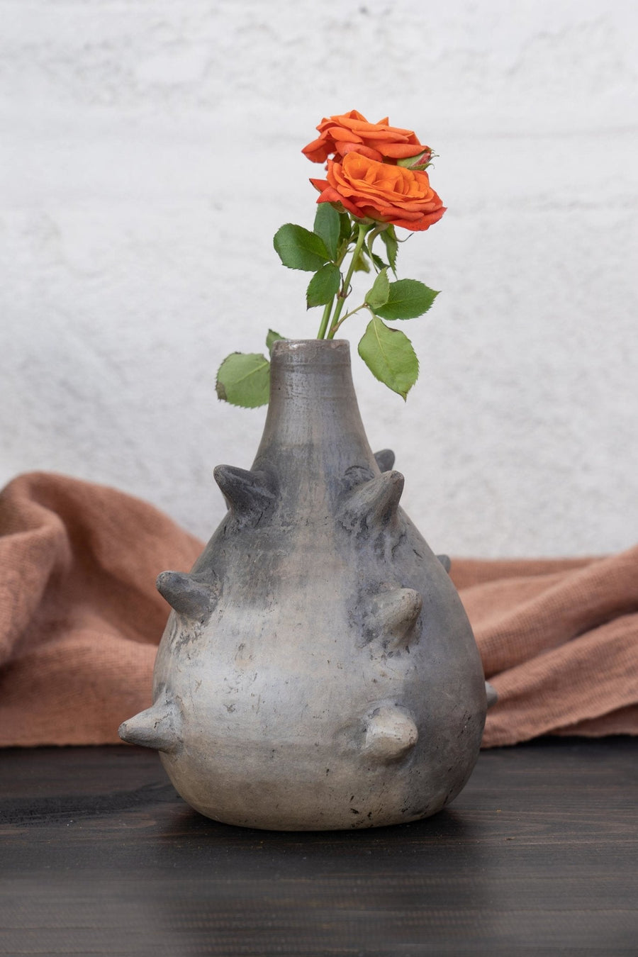 Taupe and Dark Grey Marble Pochote Vase, showcasing its natural unglazed exterior.