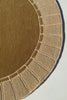video of a gold rug with arch and tile design
