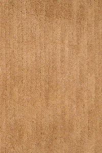 Close-up of natural tan hand-knotted wool rug surface, showing fine artisanal texture perfect for luxury area rugs and organic modern decor