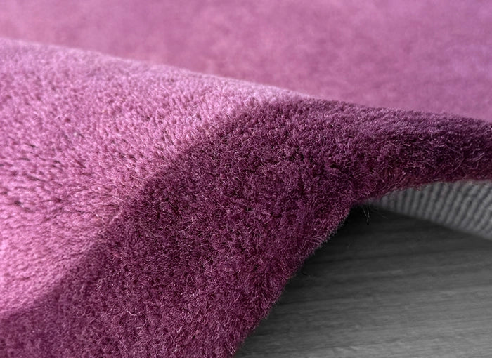 Close-up of a textured purple wool rug
