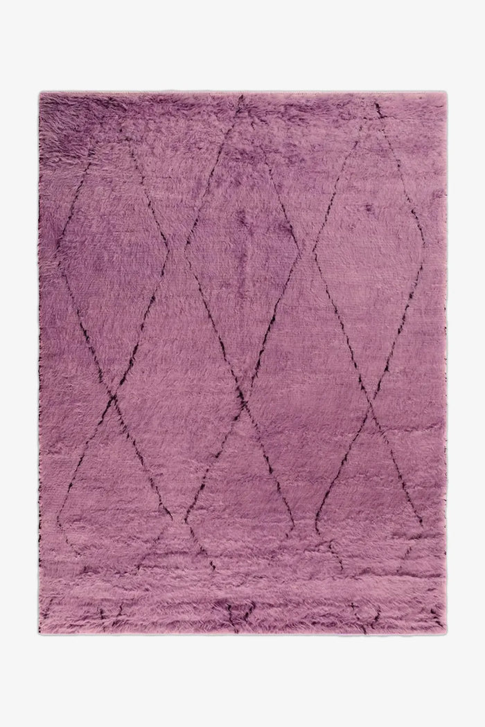 Soft purple hand-tufted shag rug with black diamond pattern, available in 5x8 and 8x10 sizes, perfect for colorful bedroom rugs or cozy living rooms