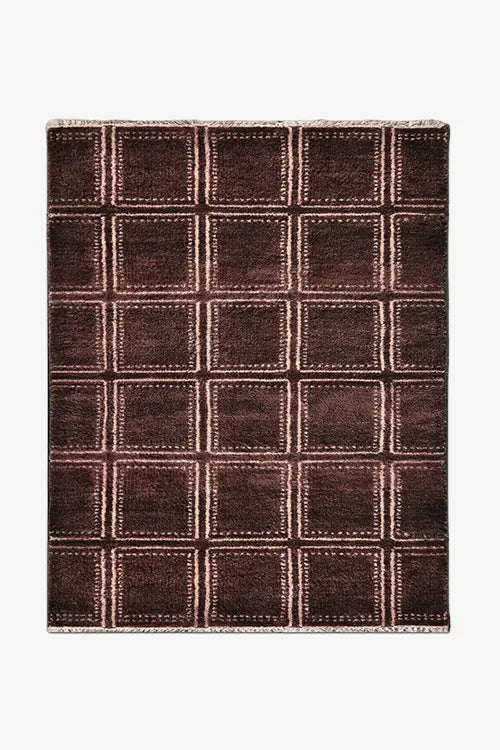 rectangular rug with brown geometric design in hand-knotted wool