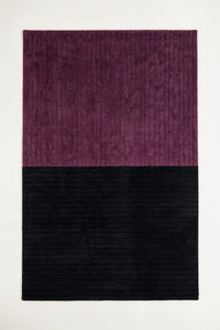 a ridge duo hand-tufted wool rug in purple and black, shown flat from above