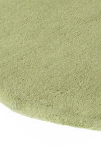 olive green tufted new zealand round wool rug 