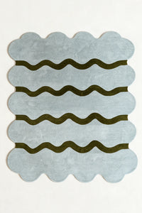 a sculpted edge hand-tufted wool rug in fog and army, shown flat from above