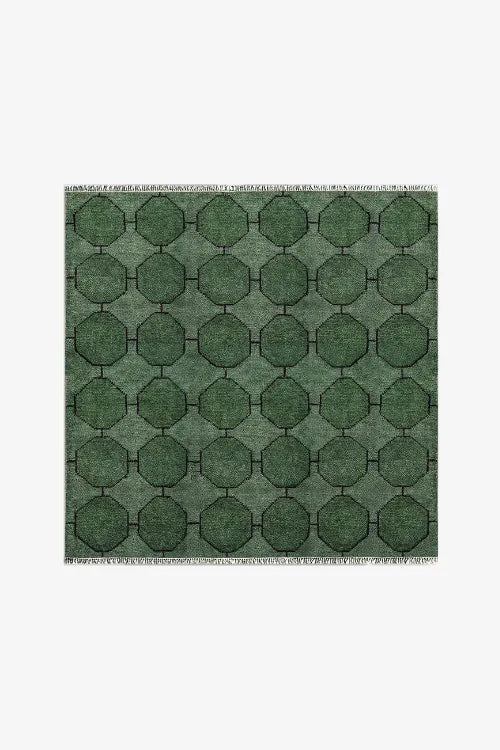 green square rug with geometric pattern
