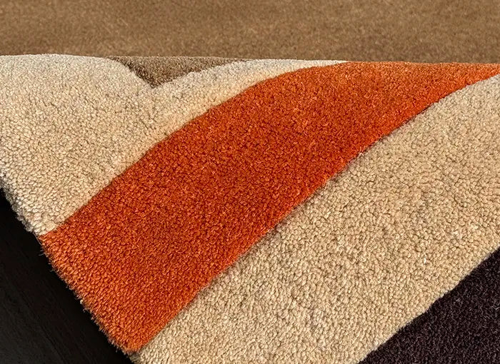Close-up of a textured rug with geometric pattern
