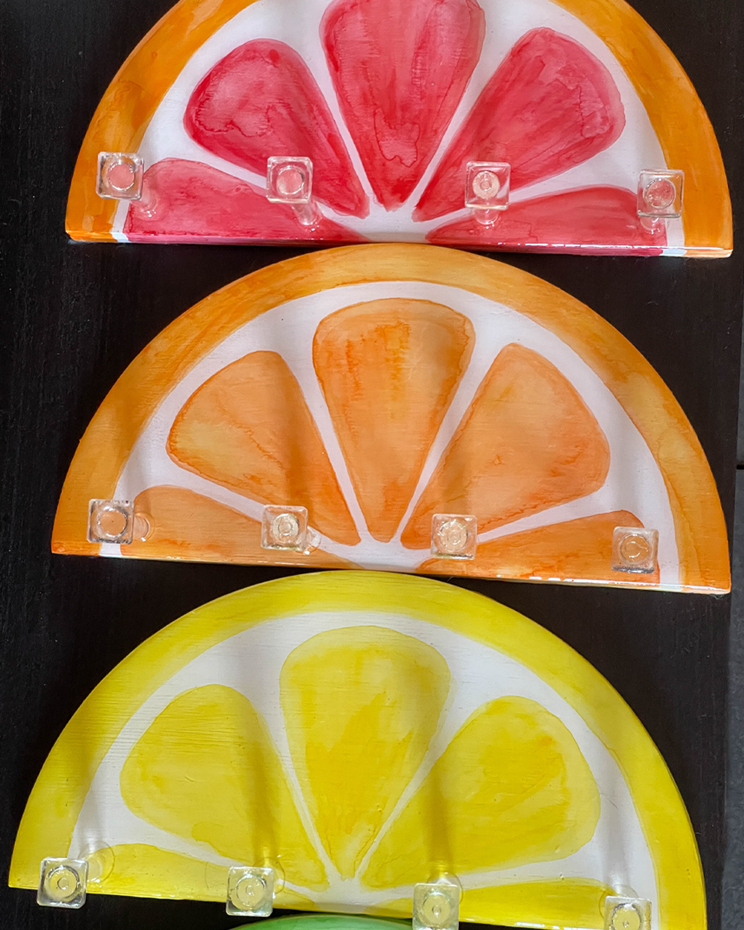 Versatile orange slice key holder, ideal for holding keys, jewelry, and other small household items