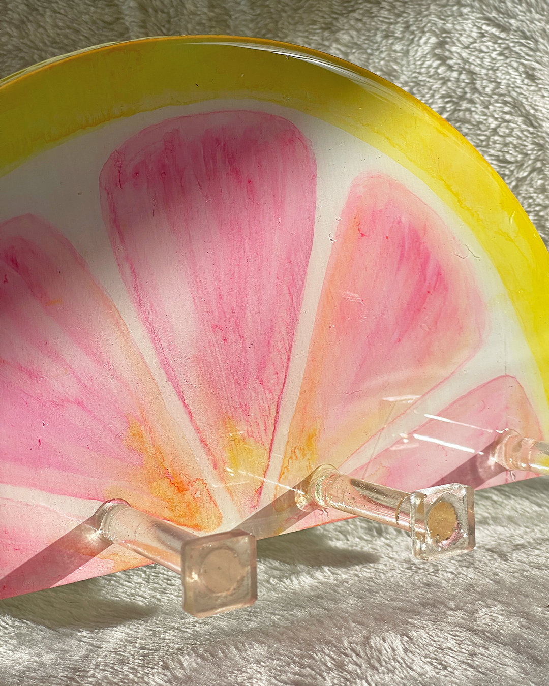 Wall-mounted pink grapefruit slice key organizer, handcrafted from wood and resin