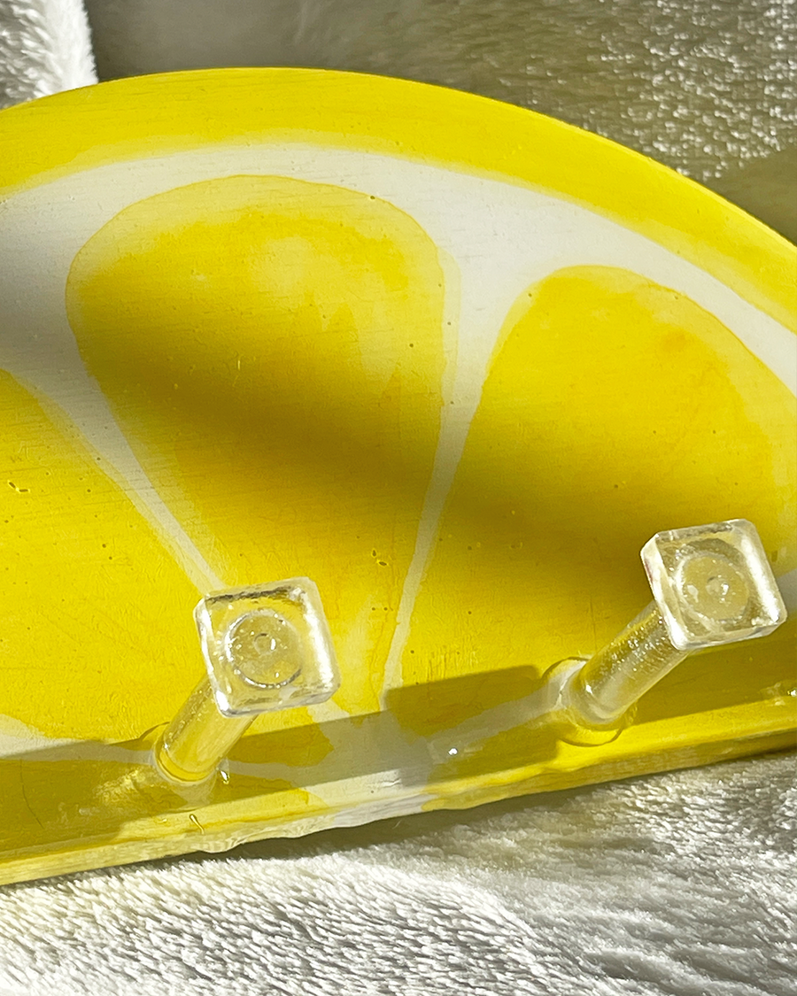 Close-up of the Lemon Slice Key Holder, showcasing detailed paintwork and realistic citrus design.