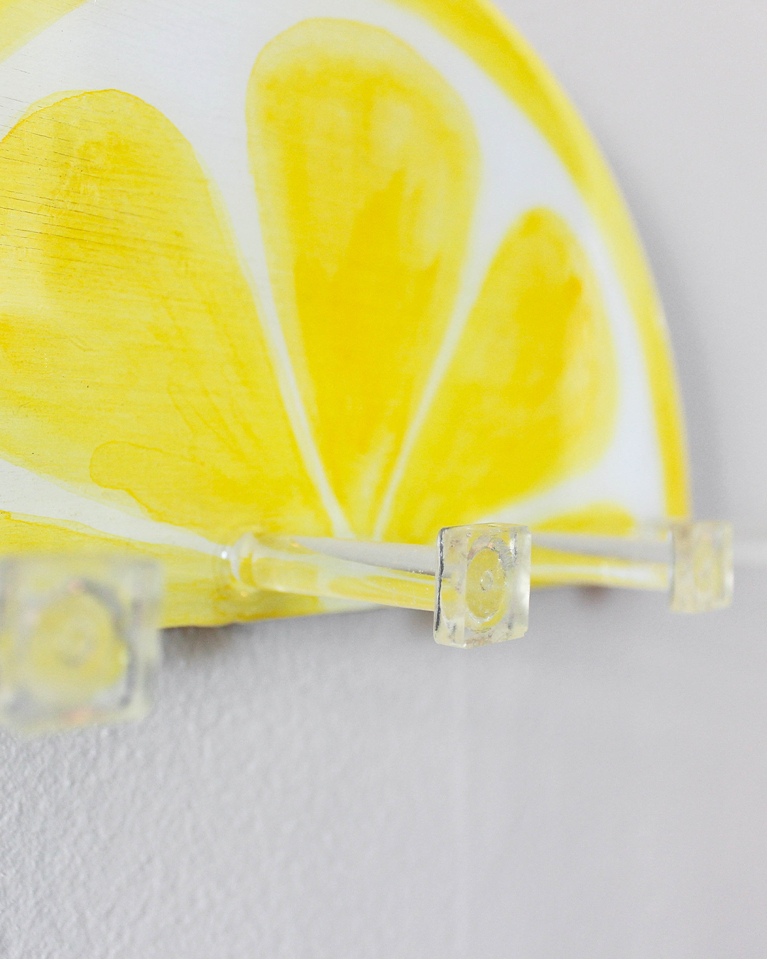Artisanal lemon slice key holder, blending functionality with a pop of color for modern home decor