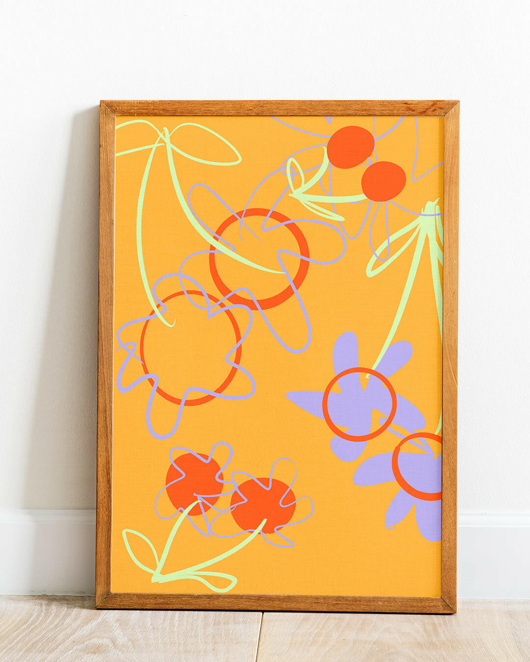 Wall art of an abstract cherry and flower design by eclectic homeware brand Jubi NYC.