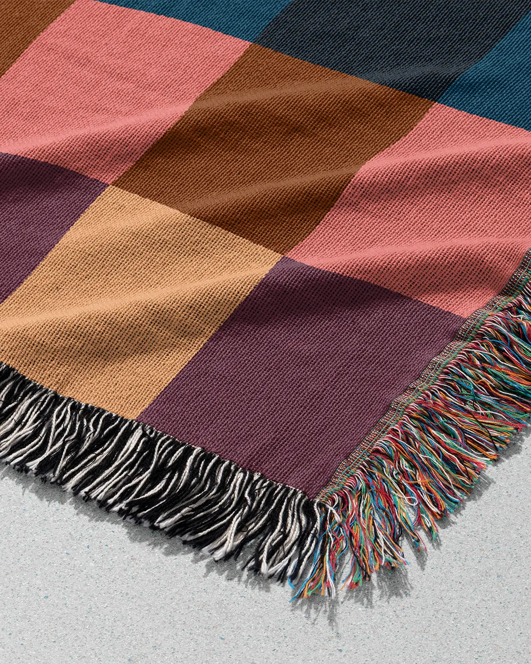 Vibrant Gingham Cotton Woven Throw Blanket with a colorful checker pattern.